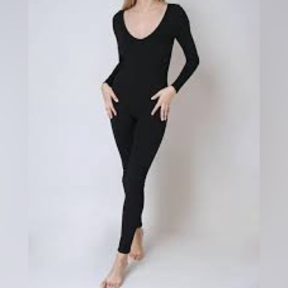 NWT Nikibiki v neck long sleeve jumpsuit O/S